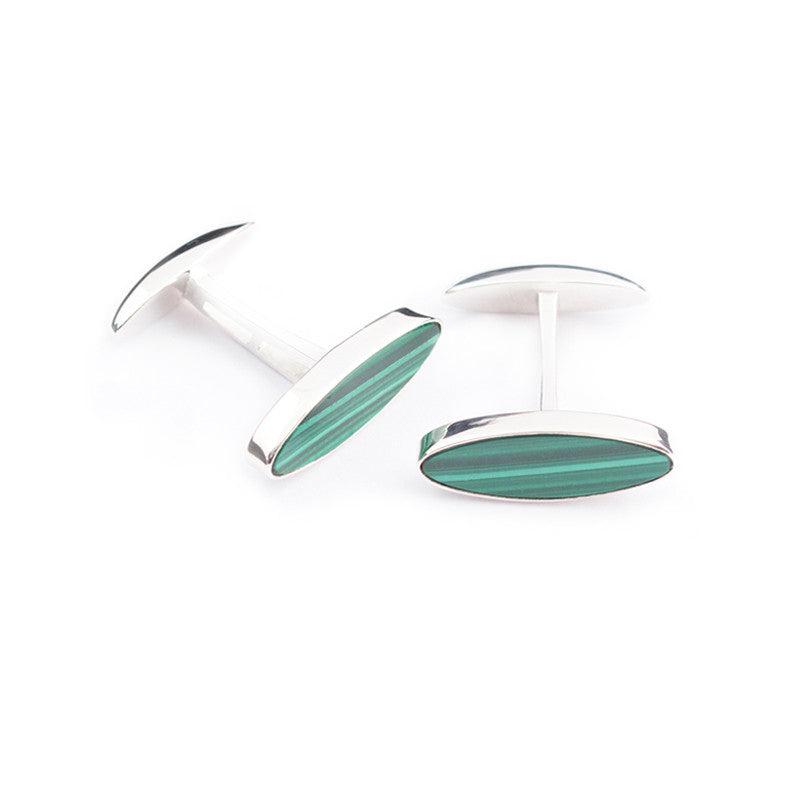 malachite cufflinks oval shaped and set in sterling silver