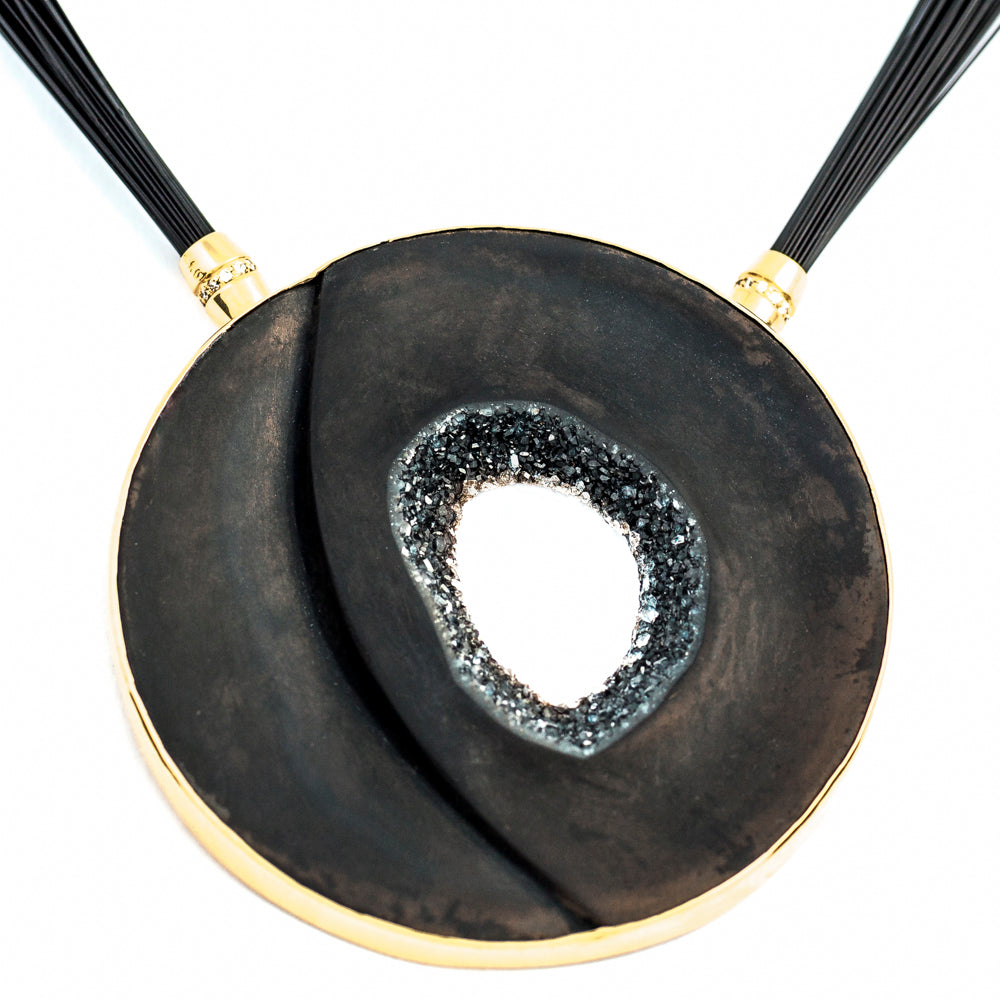 black opal stone with drusy crystals set in 18 carat gold and diamond clasp